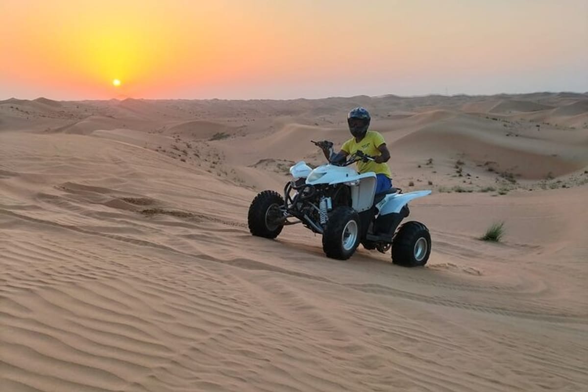 quad bike tour Abu Dhabi, private quad biking to deep desert , explore desert and quad biking , self ride quad biking 